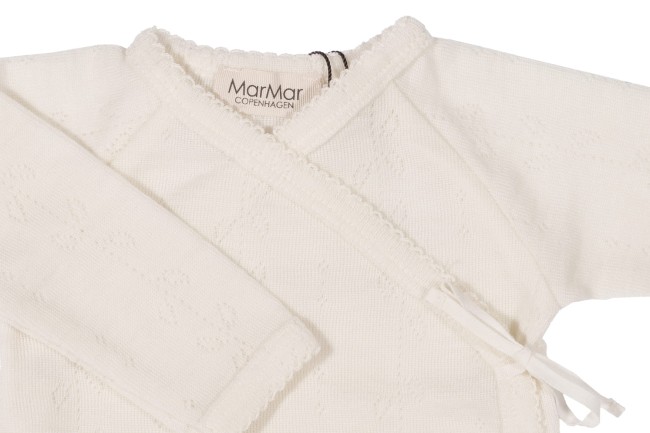Zbliżenie na kaftanik kopertowy z długim rękawem 100% wełna Merino Natural